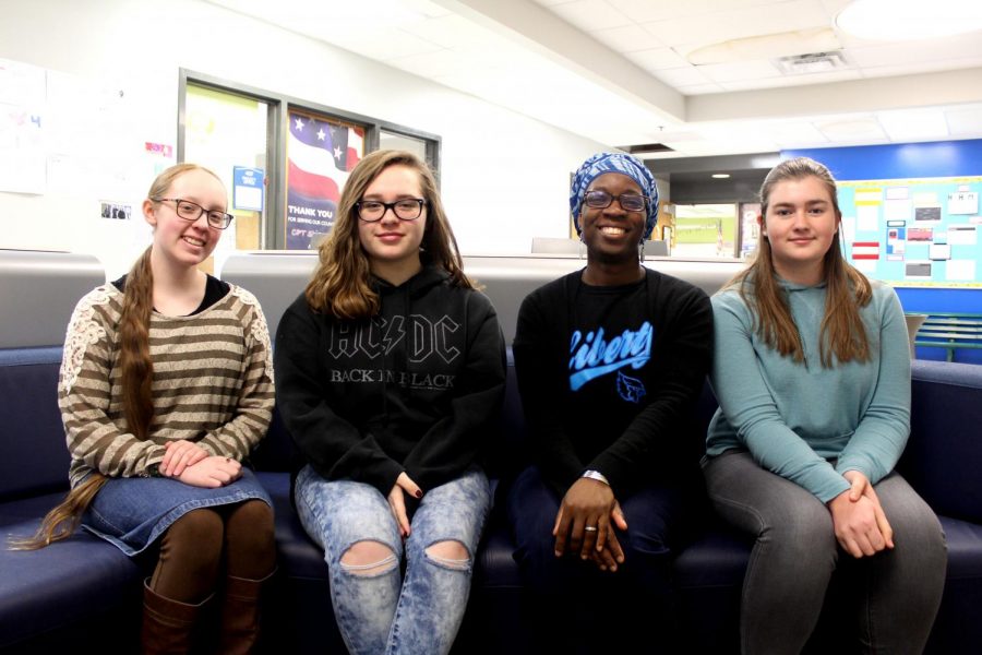 Freshman Liberty Dilbeck, sophomore
Emma Tatum, club sponsor Eniola Ajayi,
and junior Elizabeth Hall are part of Society of Women Engineers.
The club explores STEM opportunities. Photo by Charlene Nguyen.