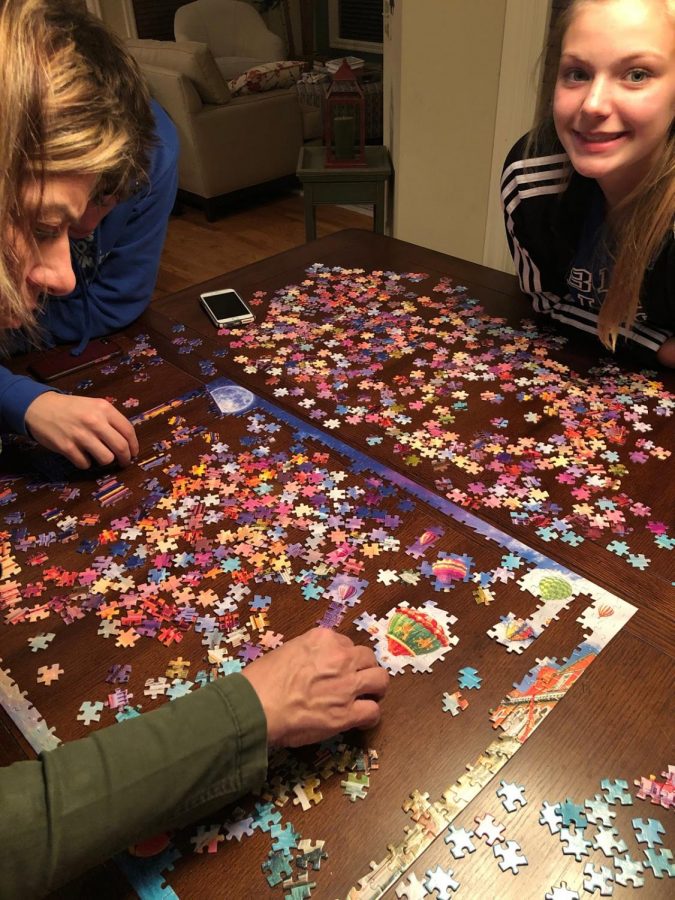 Last time to hang out with friends before my parents put me on lockdown...Spent time working on a puzzle. Photo by Makenna Smock.