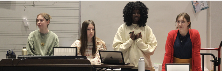 The National Art Honor Society Officers stand before the fellowship, speaking to them over matters concerning the society. Despite it being NAHS’s first year as a group, the members are ectatic about the opportunities it brings to the table. “It’s fun and exciting! I love art and now I get to put my ideas into a new honors society and showcase my skills,” sophomore Brinn Wright said.