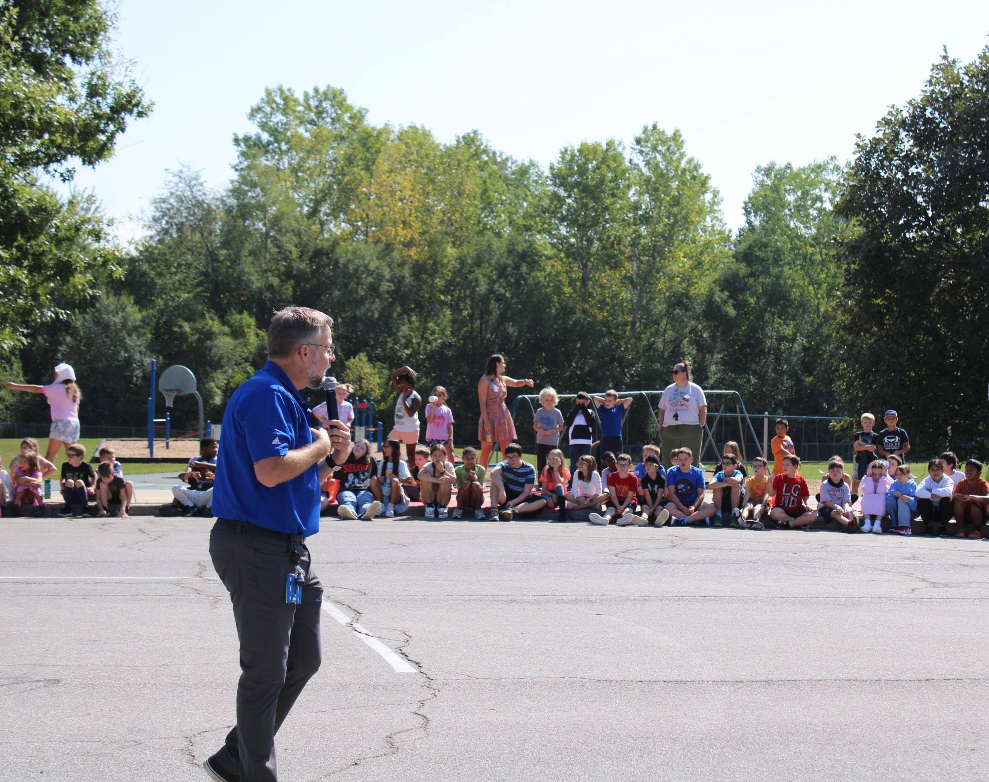 Band Director Eddie Owen talking to Lillian Schumacher Elementary during the elementary school band tour, on Sept. 12. 