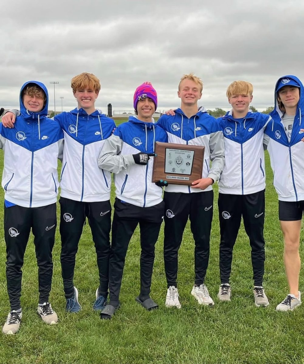 Juniors+Connor+Nicholson%2C+Todd+Yeates%2C+Patrick+Cleary%2C+senior+Evan+McWhorter+and+sophomore+Colin+McKenna+on+Oct.+14+holding+their+Conference+champions%0Atrophy.+%0APhotos+courtesy+of+Connor+Nicholson