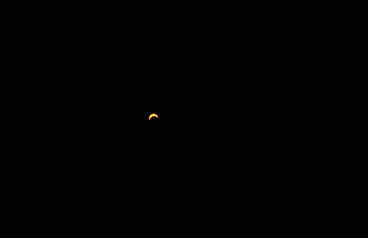 Monday, Apr. 8 at 1:28 pm students leave their seventh-hour class to gather on the football field and watch their second solar eclipse. During the first eclipse in 2017, students witnessed full totality, meaning they were able to watch as day turned shortly into night and were able to look directly at the sun without it affecting their eyes. This time the eclipse could only be seen through eclipse glasses due to the area only being able to see roughly 83% totality. “I liked watching the eclipse this year because it was a new perspective. It shows the beauty of imperfect things. The sun and moon rarely overlap each other but in doing so they create something fascinating,” junior Addyson Alderman said.
