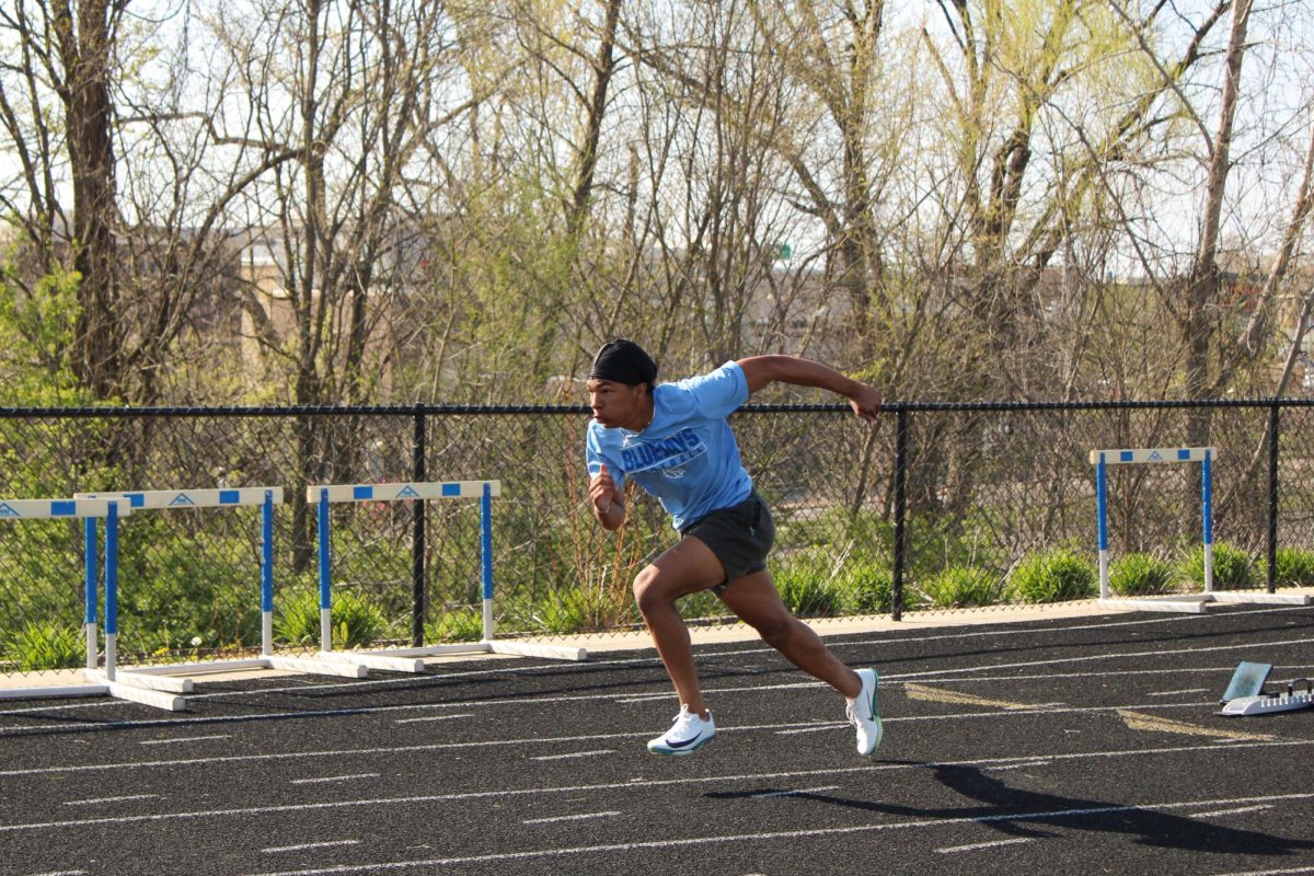 Senior Andrew Fiacco is on the varsity men’s sprint team. Fiacco’s personal record for  the 100 meters is 11.31.
   “That feeling when you cross the finish line and see a new PR is pure adrenaline and  proof that hard work pays off,” Fiacco said. Photo by Madeline Phillips