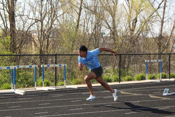 Senior Andrew Fiacco is on the varsity men’s sprint team. Fiacco’s personal record for  the 100 meters is 11.31.
   “That feeling when you cross the finish line and see a new PR is pure adrenaline and  proof that hard work pays off,” Fiacco said. Photo by Madeline Phillips