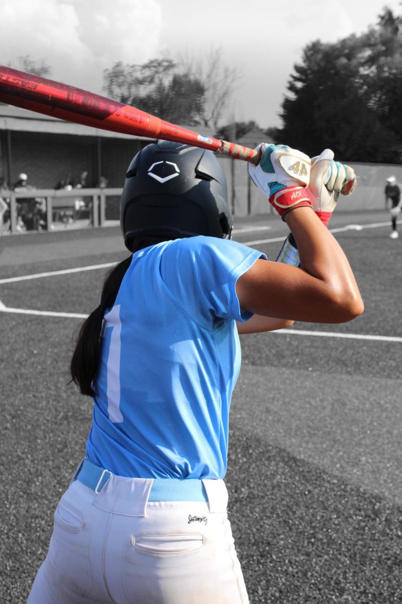 Freshman Faith Cabuyaban is a starting player on varsity softball. Faith has been playing softball for about 8 years, working up to varsity. “I'm so blessed to be able to play on varsity as a freshman, especially with some of my other club teammates. It's a different environment that I get to experience, and the fact that I get to experience it with the girls that I do is such an amazing opportunity,” said Cabuyaban. Photo by Royce Schmalz.