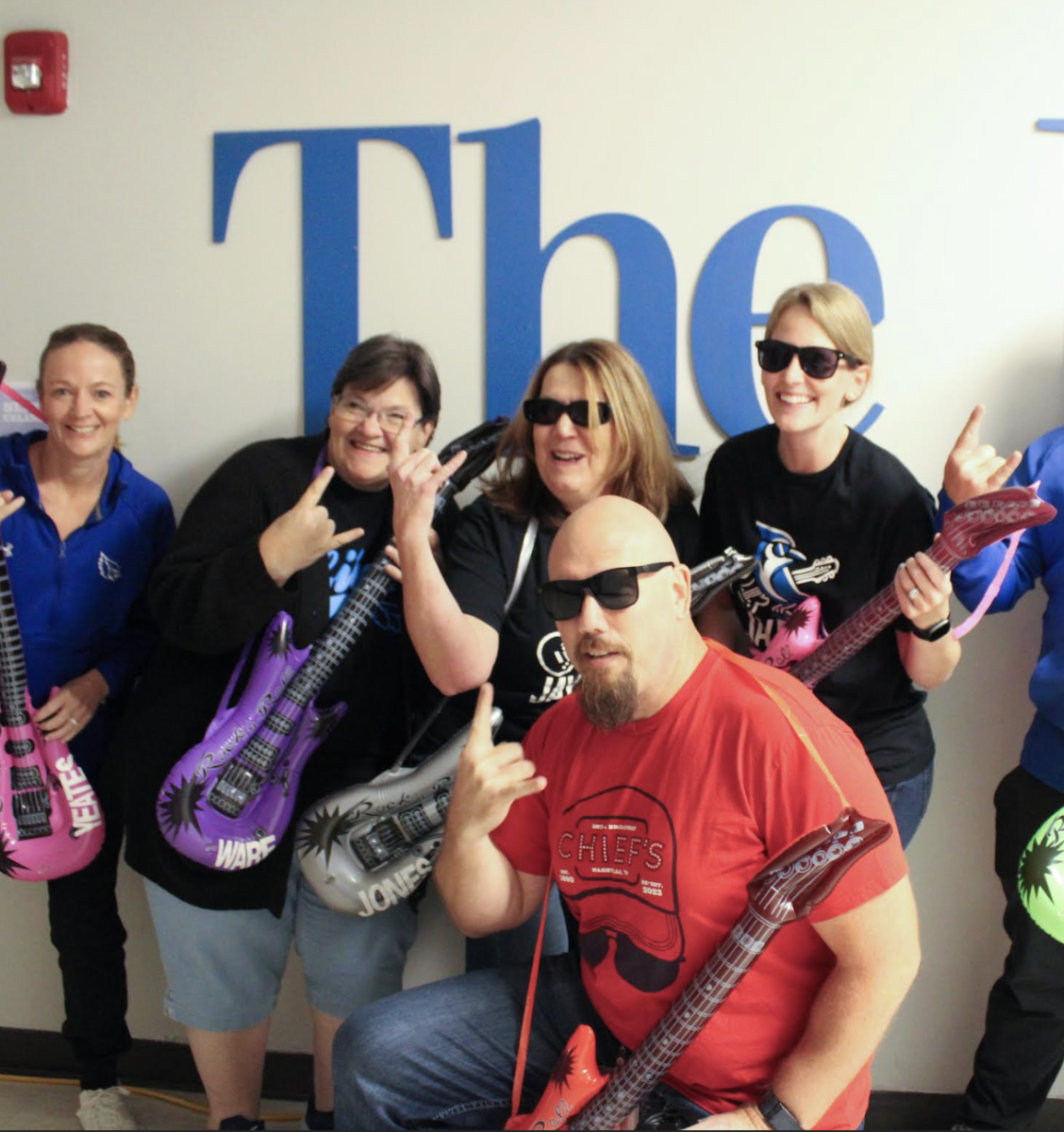 Teachers Caitlin Turpin, Bree Yeates, Roselynn Zicarelli, Joseph Barnes, Kellen Laws, Melissa Jones, and Briday Ware party hard at the Flock Party with JayRock. JayRock performed a teaser concert at the Flock Party to promote their show on Oct. 24. “It was incredible to have such a talented band guest appear for our hallway, and we had a great student turnout,” Zicarelli said.