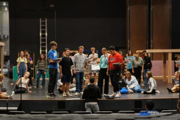 Senior Parker Blaine, Freshman Maclin Cooper, Sophomore Bennett Dohrmann, Junior Madelynn Heits and Senior Abel Enriquez talk to Choreographer Brian Duncan. The cast rehearses blocking after Hannibal, which is the first of three operas in the musical. “It’s the opening scene, it's where the main characters are first introduced to the audience members and where we start to see conflict arise in the show,” Heits said.