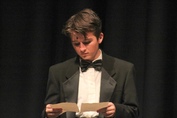 Freshman Maclin Cooper takes the stage as Monsieur André in this year's fall Musical, Phantom of the Opera. Individuals have said Cooper belongs on a stage. “I started participating in theatre in 6th grade because it seemed like a fun way to spend my afternoon, and then it took off from there,” Cooper said.