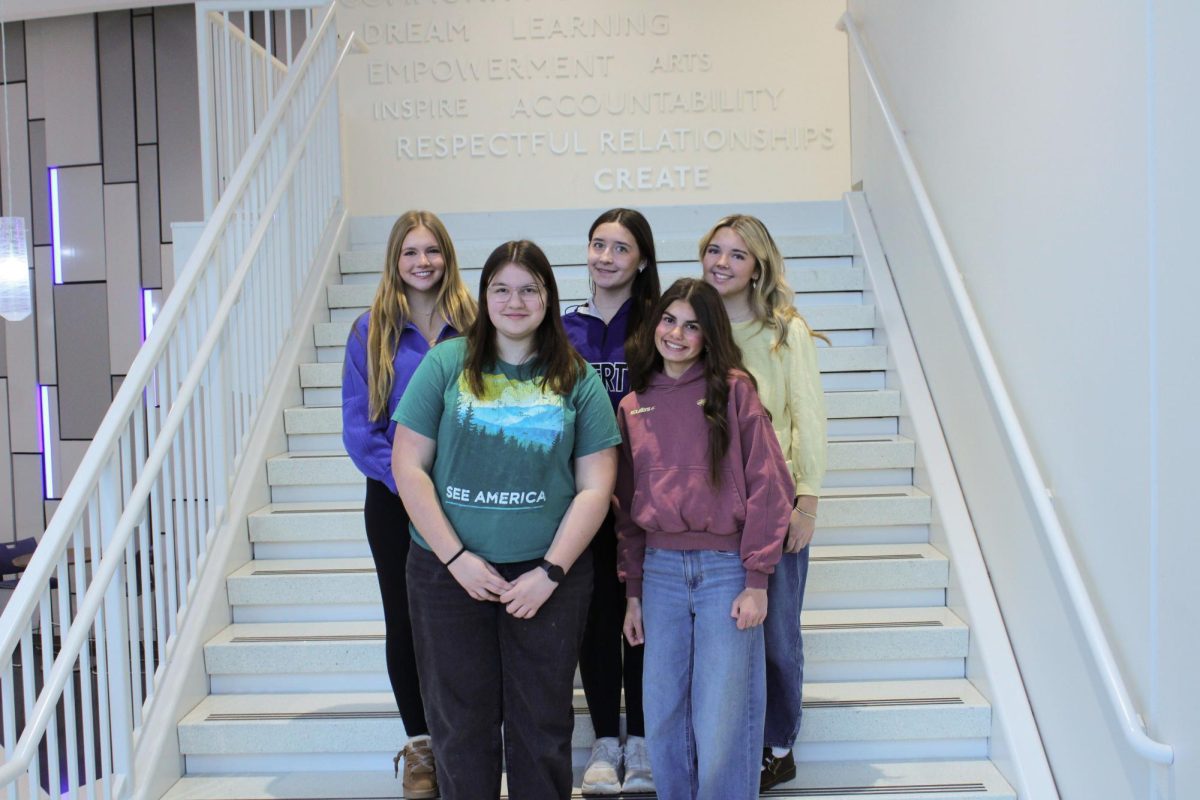 Senior Vice President Erin Bolt, President junior Aimee Taylor, sophomores Rosie Bryant, Josie Bartlett, and Mia Farrell are members of the FBLA club. Student leaders prepared for a future in business by meeting monthly. “My favorite memory from FBLA was qualifying for state my freshman year,” said Aimee Taylor. Photo by Royce Schmalz. 