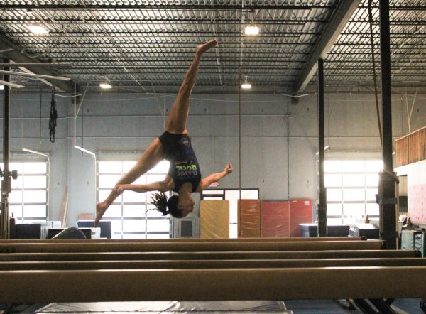Sophomore Charlie Gutierrez is going strong in her 11 years of gymnastics. This shows how determined and dedicated she is to this sport, and how much time and effort she puts into getting where she is at now in her gymnastics career. “ My biggest supporters are my parents and coaches; they are always supporting me and pushing me to be the best person and gymnast I can be,” Gutierrez said. Photo by Royce Schmalz.